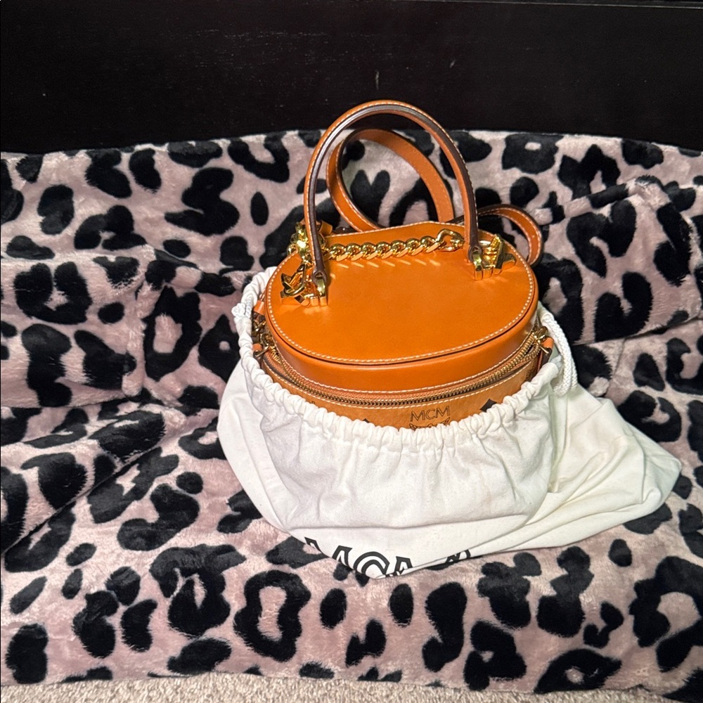MCM Orange Mini Bag with Gold Accents